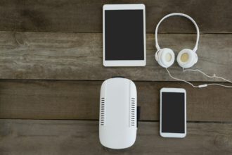 Various electronic gadgets on wooden surface