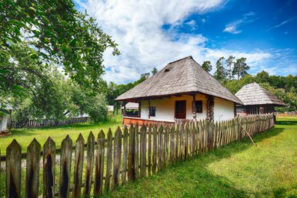 View of traditional romanian peasant houses in Transylvania, Romania.