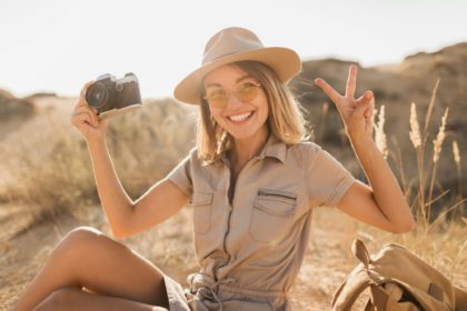 woman in desert walking on safari